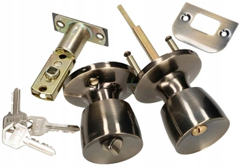 Otočný knoflík se zámkem pro křídlové dveře patina